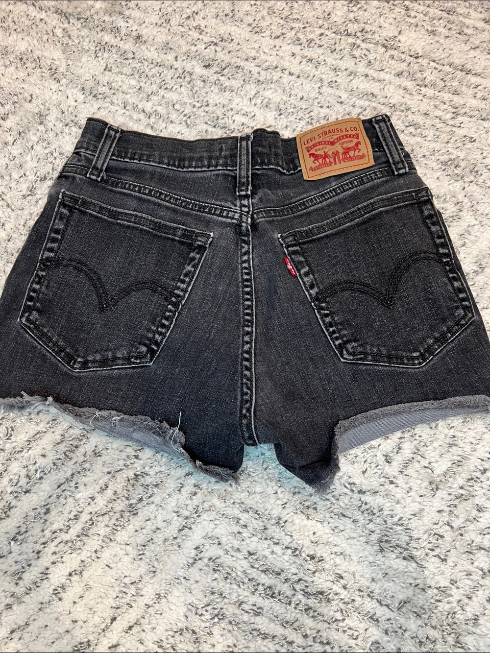 Levi’s High-Rise Black Wash Denim Cutoff Shorts